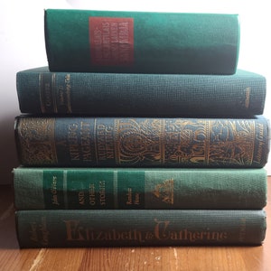May include: A stack of five green hardcover books with gold lettering. The titles include "A Kipling Pageant", "Rudyard Kipling", "Elizabeth & Catherine", "Leatherstocking Tales", and "And Other Stories".
