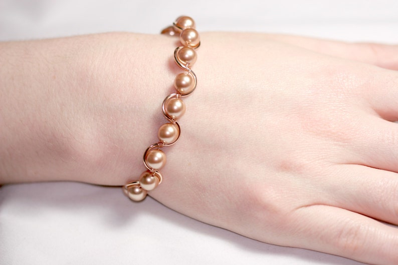 14K rose gold filled bracelet 7.5 inches around with multiple 8mm rose gold metallic pearls handmade by Jessica Luu Jewelry