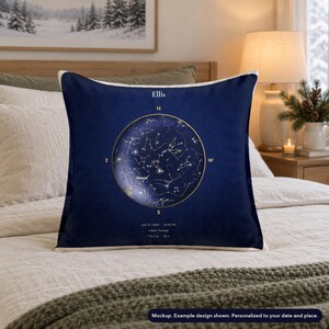 Mockup of a personalized star map pillow cover on a bed with holiday styling. Example design shown. Styling is not included.
