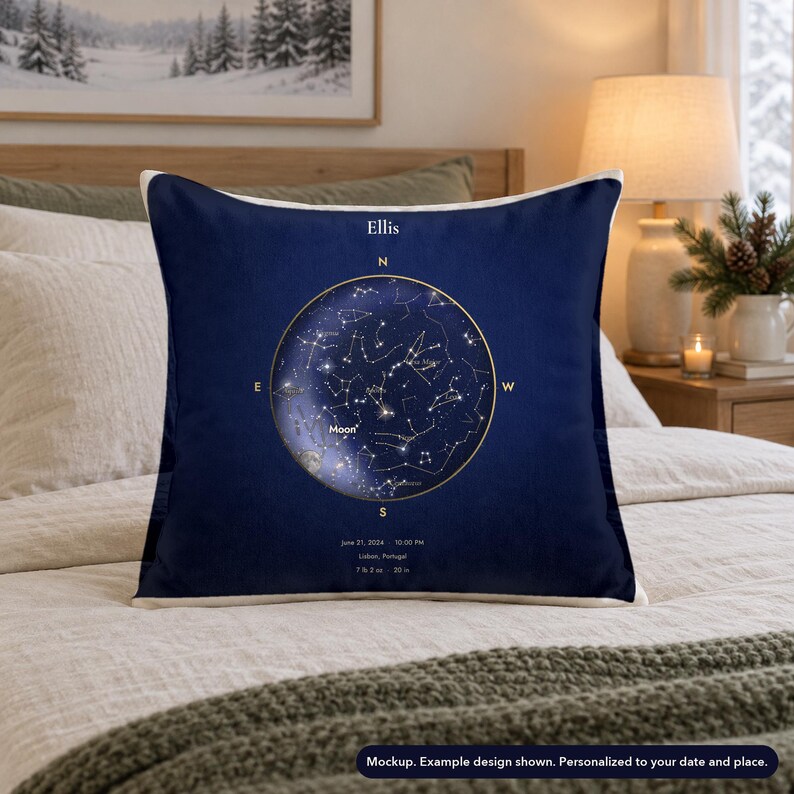 Mockup of a personalized star map pillow cover on a bed with holiday styling. Example design shown. Styling is not included.