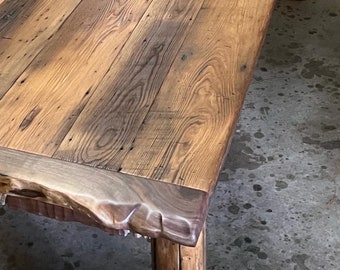 Rustic chestnut dining table. Live edge breadboards.