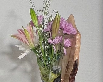 Unique wood and resin sculptural vase.