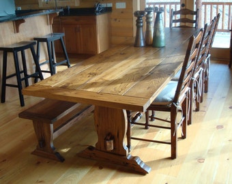 Beautiful handcrafted wormy chestnut trestle dining table.