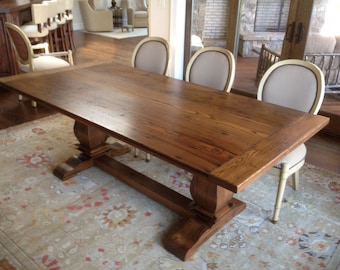 Trestle dining table in reclaimed chestnut.