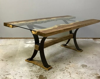 Wood , glass and steel table or desk. Maple slabs resting on bronze powder coated steel base, ambrosia maple stretcher, base foot.