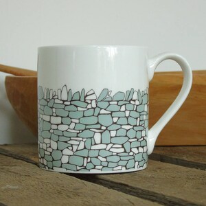 Caneca de parede de pedra seca