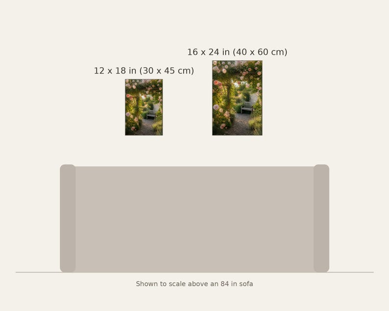 May include: Two rectangular wall art prints featuring a garden path with pink flowers and a bench. The smaller print is 12 x 18 inches and the larger is 16 x 24 inches. They are displayed above an 84 inch sofa for scale reference.