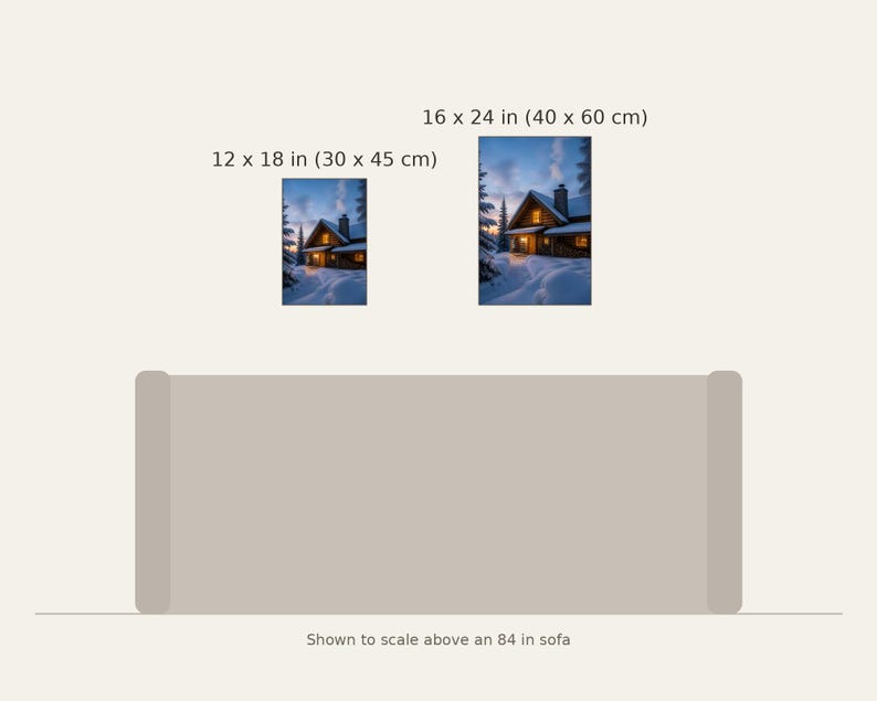 May include: Two vertical wall art prints depicting a snow-covered cabin at twilight, available in 12 x 18 inches and 16 x 24 inches, displayed to scale above an 84 inch sofa. The cabin features warm glowing windows and a chimney.