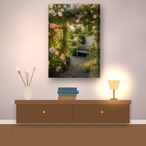 May include: A rectangular wall art print featuring a garden scene with a wooden bench positioned under an archway covered in blooming pale pink roses. The path is made of gravel and leads toward a stone wall in the background of the image.