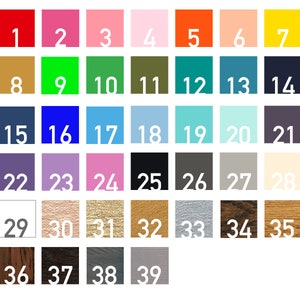 Op de afbeelding: Een kleurenkaart met 39 verschillende kleuren, genummerd van 1 tot en met 39. De kleuren zijn gerangschikt in rijen en kolommen. De kleuren omvatten rood, roze, geel, groen, blauw, bruin, wit, zwart en grijs.