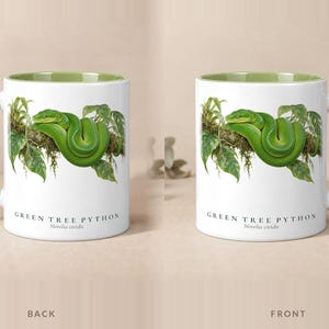 Back and front of the Green Tree Python mug with a green handle — the design is printed on both sides