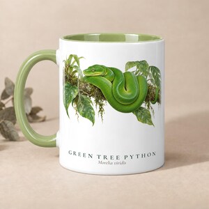 The other side of the Green Tree Python mug, handle on the left, green handle