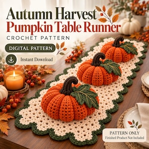May include: A crochet pattern for an Autumn Harvest Pumpkin Table Runner. The image displays a cream-colored runner with a dark green scalloped border, topped with three orange crocheted pumpkins featuring dark brown stems and green leaves.