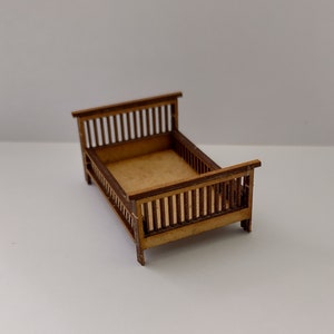 Dollshouse miniature quarter scale (1/48) bed.