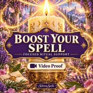 May include: A cream-colored pillar candle sits in a gold-toned metal holder. A purple sign with gold trim reads "BOOST YOUR SPELL FOCUSED RITUAL SUPPORT" and "Video Proof". The scene includes lavender flowers, crystals, and a sealed envelope.