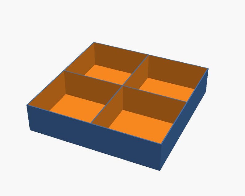 May include: A square storage box with a dark blue exterior and a bright orange interior. The box is divided into four equal compartments by two intersecting perpendicular partitions that create four distinct open sections.