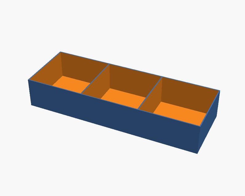 May include: A rectangular storage tray with three separate compartments. The exterior of the tray is a solid dark blue colour, while the interior walls and the base of each of the three sections are a bright orange colour.