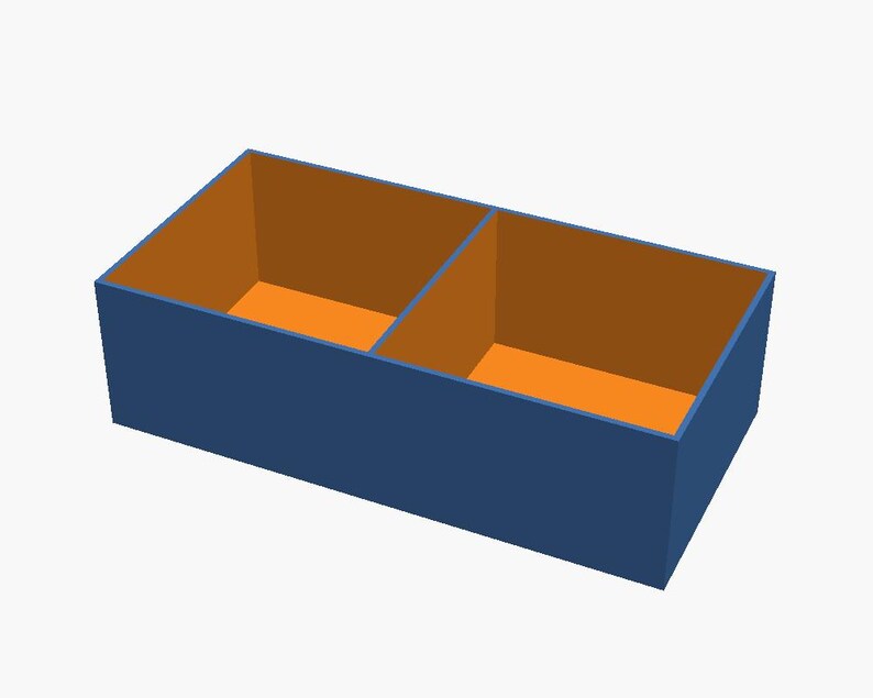 May include: A rectangular storage box with a blue exterior and an orange interior. The box is divided into two equal compartments by a central blue partition, creating two distinct open sections for organising items within the container.