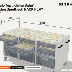 May include: A white play table with a printed train track surface, featuring multiple gray storage bins and black handles. The table includes dimension lines labeled 600 and 1291. Text includes Druck-Top Kleine Bahn, SPANT, and RACK PLAY.
