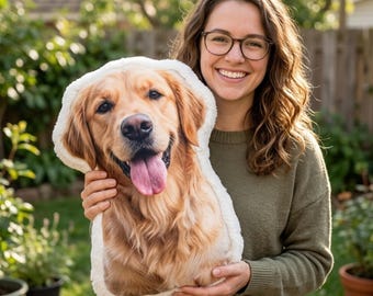 May include: A custom-shaped throw pillow featuring a high-resolution photographic print of a golden retriever dog with its tongue out, surrounded by a soft, white, textured plush border that follows the contour of the dog's head and neck.