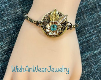Sweet UpcycLeD Bracelet-Repurposed Vintage Jewelry-Handmade Assemblage-Rose Gold & Yellow Gold Flower Design-Blue Topaz Glass Stone