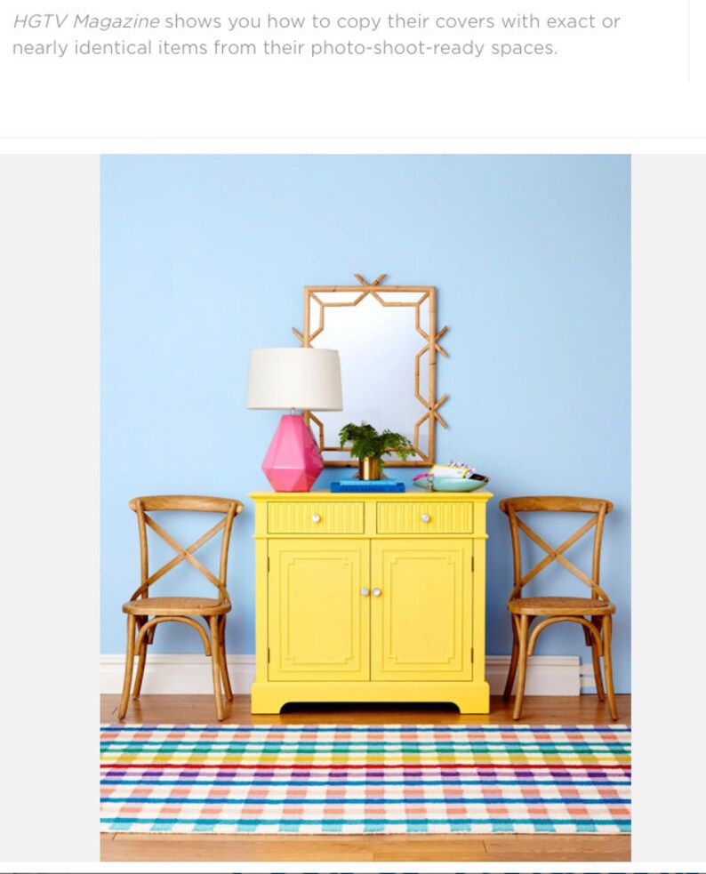 HGTV magazine used Jewelry for Your Home by Stephen D Evans mother of pearl knobs on a yellow table.  The interior design look with th pearl decor can be classic or eclectic.