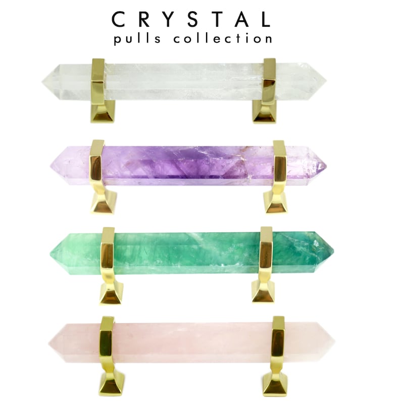 crystal cabinet pulls with solid brass hardware in different colors such as clear quartz, amethyst, green fluorite and rose quartz