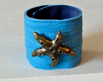 Breites Damen Armband aus Leder, mit Seestern und Wellen, Schnapparmband, türkis, One Size