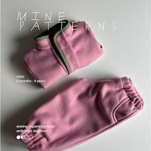 May include: A pink fleece pullover with a green trim and snap buttons, paired with matching pink fleece pants. The text MINE PATTERNS, sizes: 0 months - 9 years, and sewing experience level: ambitious beginner are visible on the image.