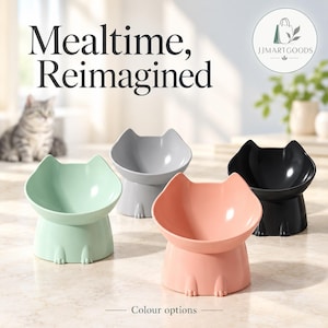 Puede incluir: Cuatro cuencos para mascotas con forma de gato en verde menta, gris claro, rosa suave y negro. Cada cuenco tiene una base elevada con detalles de patas moldeadas y siluetas de orejas de gato en el borde. El texto dice Mealtime, Reimagined y JJMARTGOODS.