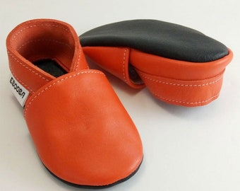 orange baby shoes