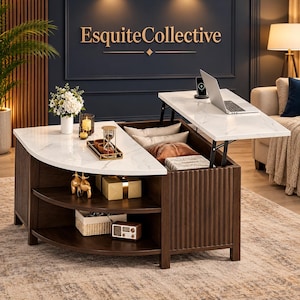May include: A dark wood coffee table with a white marble-patterned top, featuring a lift-top section with a laptop, open storage shelves, and a hidden compartment. The table has vertical slat detailing and the text EsquiteCollective on the wall.