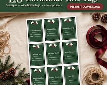 May include: A printable sheet of nine rectangular Christmas gift tags in dark green with white borders. Each tag features a white mistletoe graphic, the text Merry Christmas, Happy Holidays, Season's Greetings, Peace & Joy, or Joy to the World.