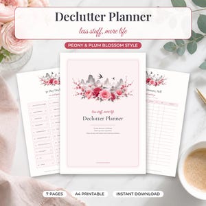 May include: A printable declutter planner set featuring a soft pink cover with a floral illustration of peonies and plum blossoms, mountain silhouettes, and birds. The text reads Declutter Planner, less stuff, more life, and 30 Day Declutter Challenge.