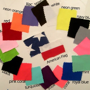 May include: A collection of fabric swatches in various colors, including red, blue, green, yellow, orange, pink, purple, and black. The swatches are arranged in a circle around an American flag.