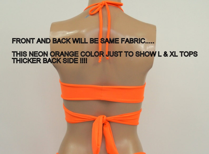 May include: Back view of a neon orange halter top with a criss-cross design and a tie at the back. "FRONT AND BACK WILL BE SAME FABRIC..... THIS NEON ORANGE COLOR JUST TO SHOW L & XL TOPS THICKER BACK SIDE !!!!" is written on the image.