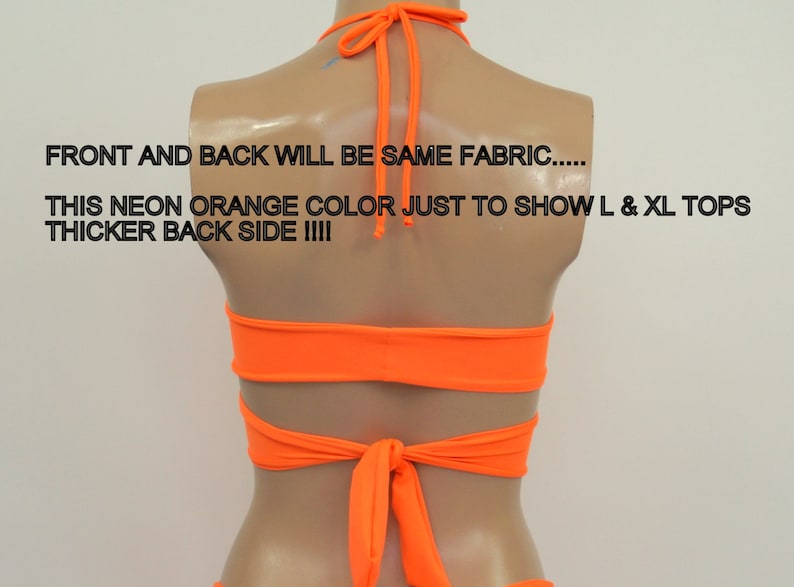 May include: Back view of a neon orange halter top with a criss-cross design and a tie at the back. "FRONT AND BACK WILL BE SAME FABRIC..... THIS NEON ORANGE COLOR JUST TO SHOW L & XL TOPS THICKER BACK SIDE !!!!" is written on the image.