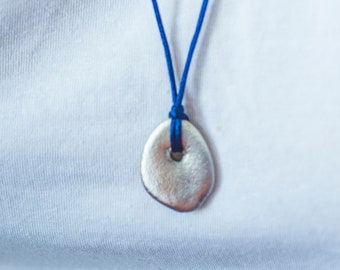 925 Sterling Silver sea stone on an adjustable silk thread