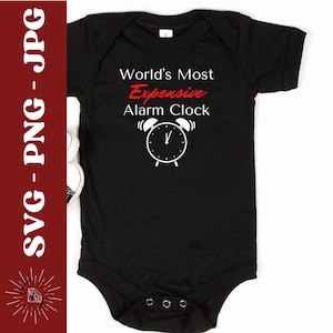 May include: Black baby onesie with white text that reads "World's Most Expensive Alarm Clock" with a red "Expensive" and a white alarm clock graphic.