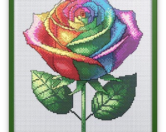 May include: A rainbow rose with green leaves and a stem, embroidered in a white frame.