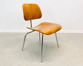 authentic Herman Miller Charles Eames DCM chair in light walnut