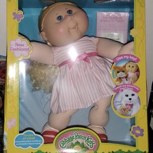 Cabbage Patch Kid 2016. Blonde ponytail, blue eyes and red shoes!