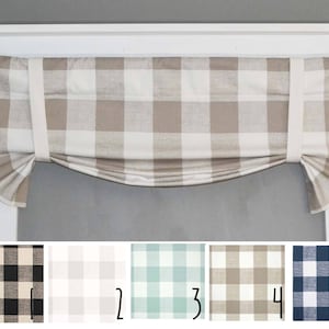 May include: A valance window treatment with a brown and white buffalo plaid pattern. The valance is gathered at the top and has a curved bottom edge. The valance is shown in five different color variations.