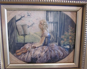 Old frame with raised effect Technique made of plaster Young woman with violin