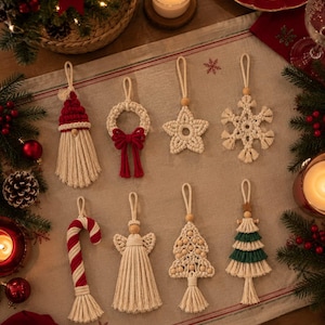 May include: A set of eight macrame Christmas ornaments featuring a gnome, a wreath with a red bow, a star, a snowflake, a candy cane, an angel, a tree with wooden beads, and a layered green tree, all with hanging loops and wooden beads.