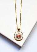 Handmade Embroidered Flower Necklace: Dainty Floral Pendant product logo