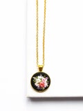 Embroidered Floral Pendant Necklace: Handmade Fiber Art Jewelry product logo
