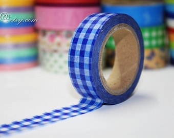 May include: A roll of blue and white gingham washi tape with a strip unrolled. Other rolls of colourful washi tape are in the background. The text "Mierya@etsy.com" is in the upper left corner.