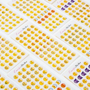 Emoji sticker apple horizontal version of the new emojis rolling eyes with 660 mini-emojis 12 entries