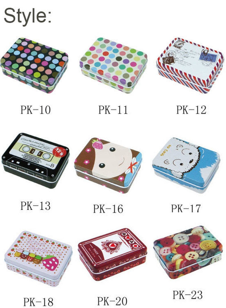 May include: Assortment of small, rectangular tin boxes with various colorful designs. The designs include polka dots, a cassette tape, a cartoon girl, a polar bear, strawberries, playing cards, and buttons.